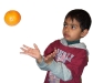 Boy catching orange.jpg